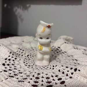Vintage Porcelain Kewpie Nurse Holding a Baby